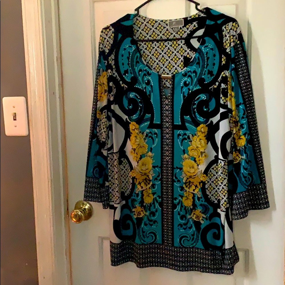 Beautiful long sleeve tunic with rhinestones